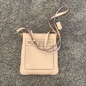 Light pink Coach crossbody purse